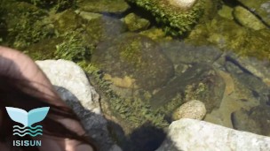 beautiful blonde is seen swimming alone naked and warms up facial in the face