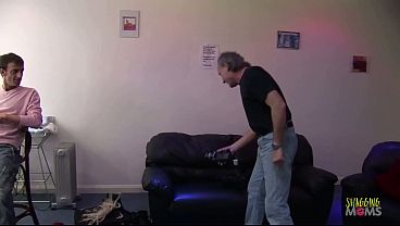 Wearing stockings helps the brunette milfs with fake boobs get in the mood for group sex